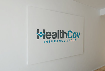 HealthCov Insurance Group, LLC logo on the wall